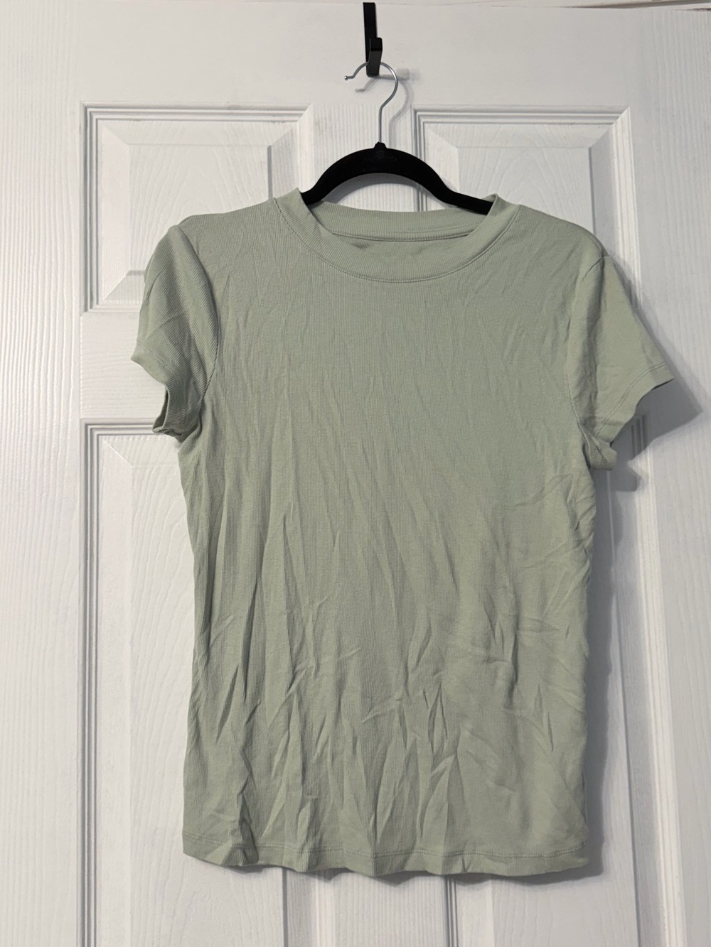 A new day mint green t shirt with high neckline size large
